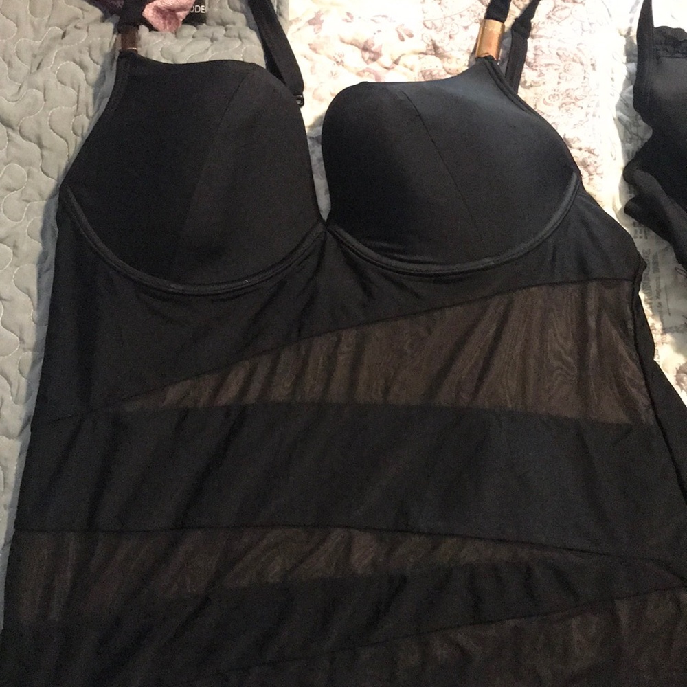 Two swimsuit tops. Tankini